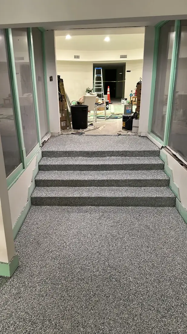 Interior steps and landing finished with a gray flake coating