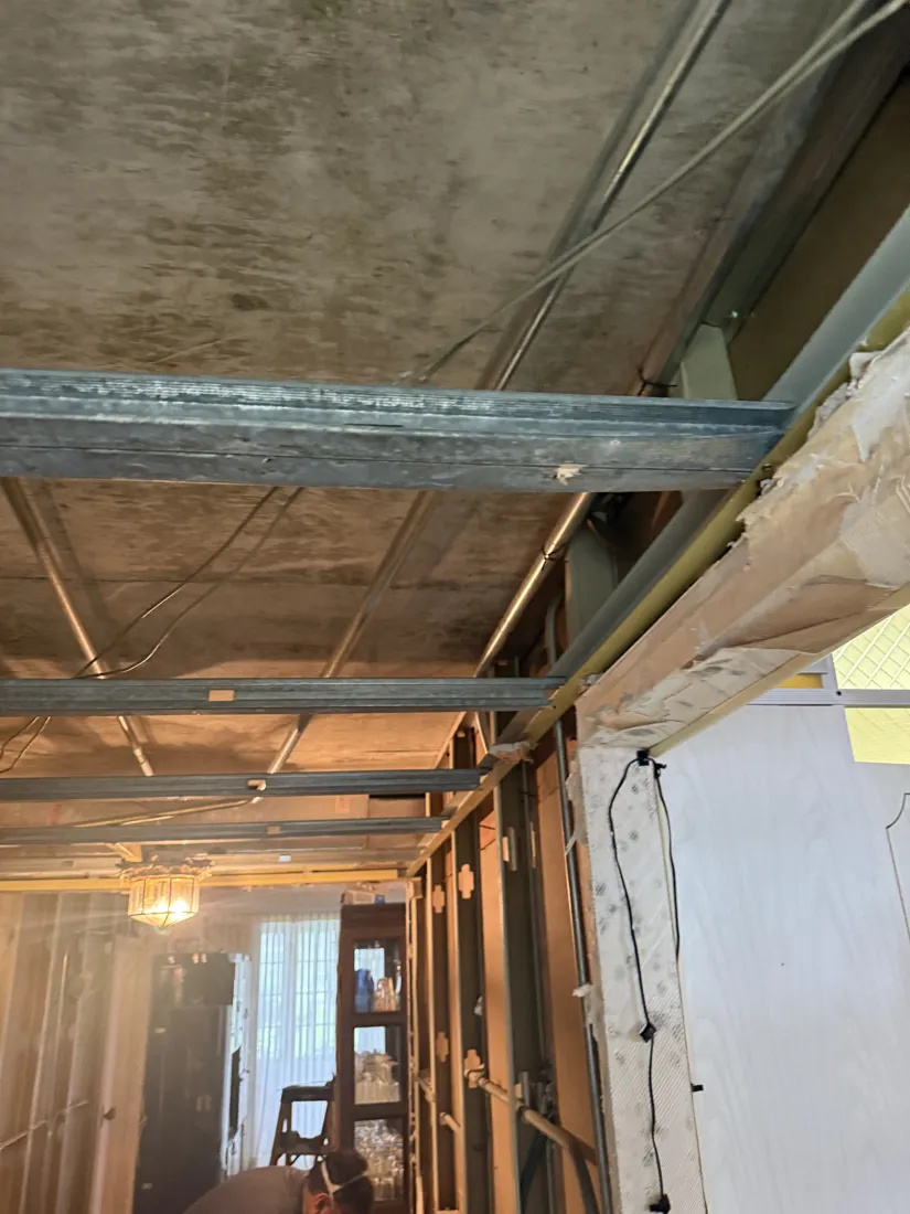 Ceiling and walls opened to the structure after mold-damaged materials were removed