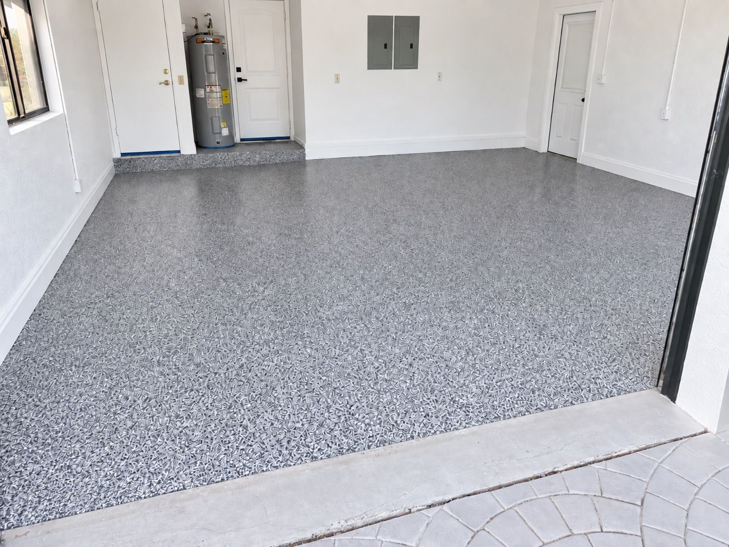 Piso de garaje con recubrimiento poliaspártico full flake, Parkland FL