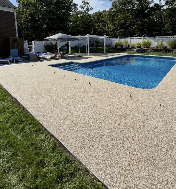 Área de piscina con acabado de flake decorativo, condado de Palm Beach FL